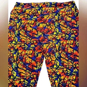 Lularoe TC orange& blue floral leggings.OG designer Patrick quality & fit.